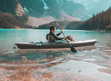 man canoeing