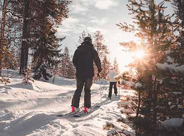 two people skiing