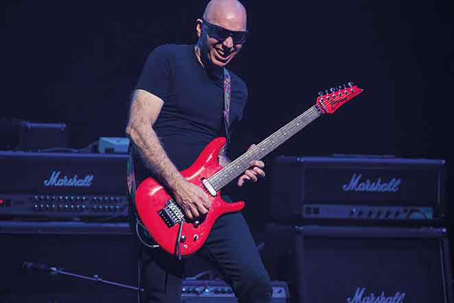 Joe Satriani playing guitar